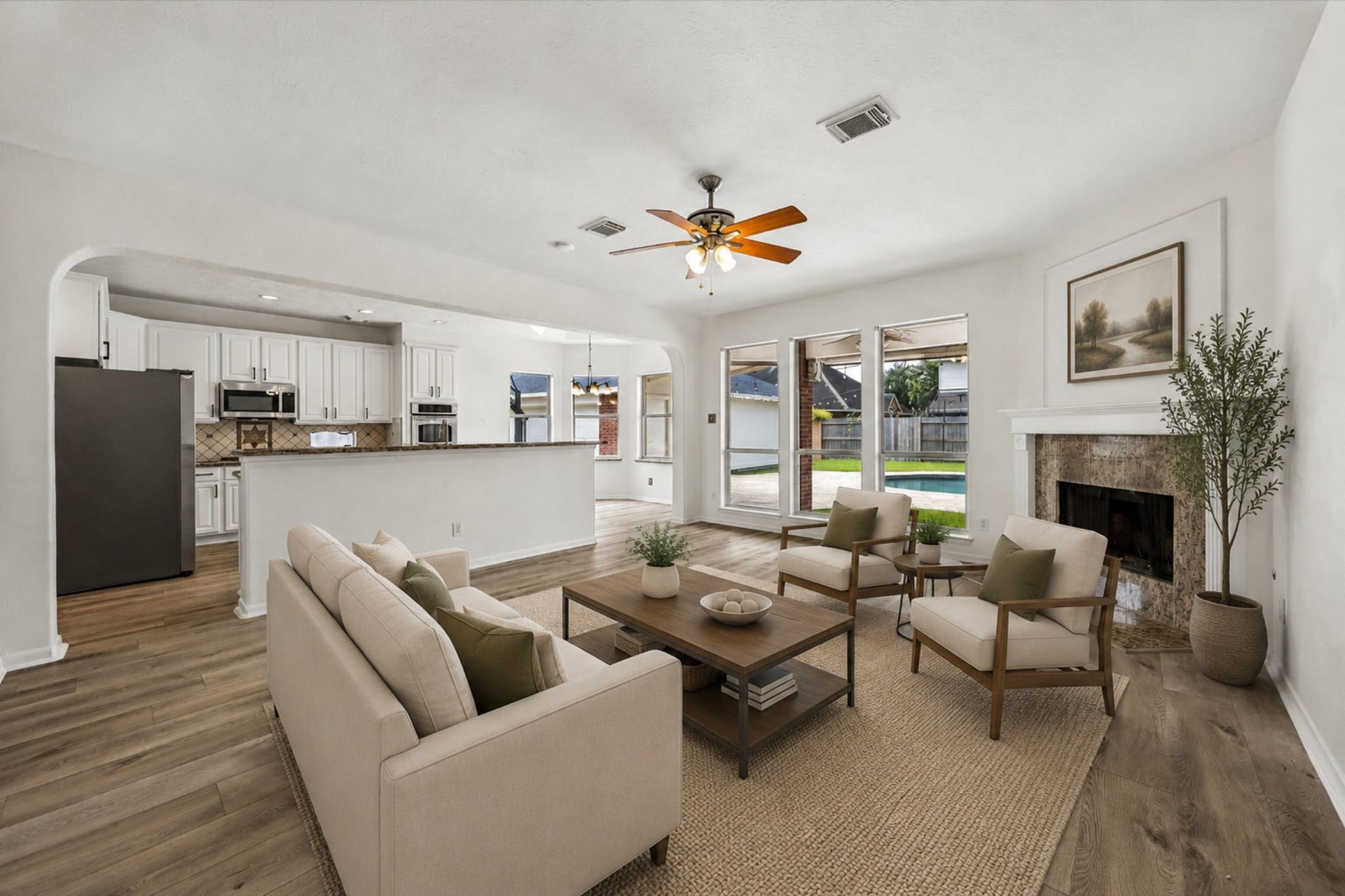1331 SHADY BEND DRIVE, Sugar Land, TX 77479 The open-concept family room flows seamlessly into the kitchen, creating the perfect space for everyday living and entertaining.**Virtually Stage.