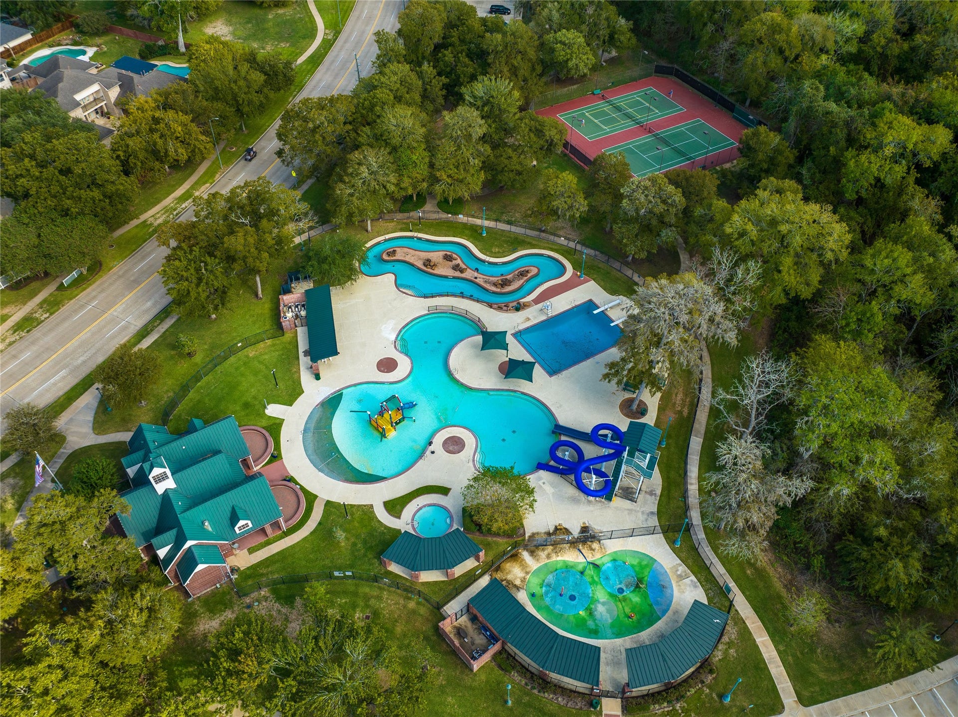 1331 SHADY BEND DRIVE, Sugar Land, TX 77479 FAMILY-FRIENDLY WATER PARK FEATURES WINDING SLIDES, PLAY STRUCTURES, AND A LAZY RIVER