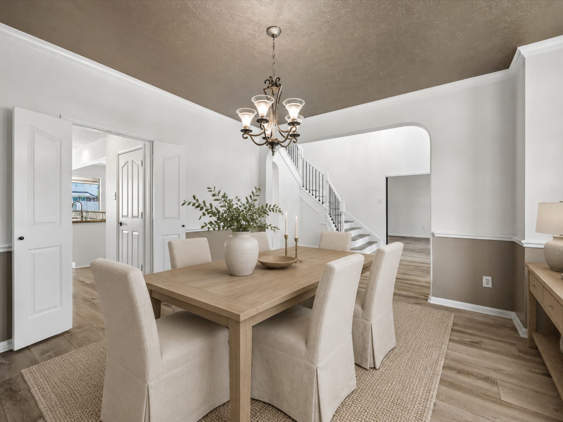 1331 SHADY BEND DRIVE, Sugar Land, TX 77479 Another view of the spacious dining room highlights its open connection to the foyer and main living areas. **Virtually Stage.