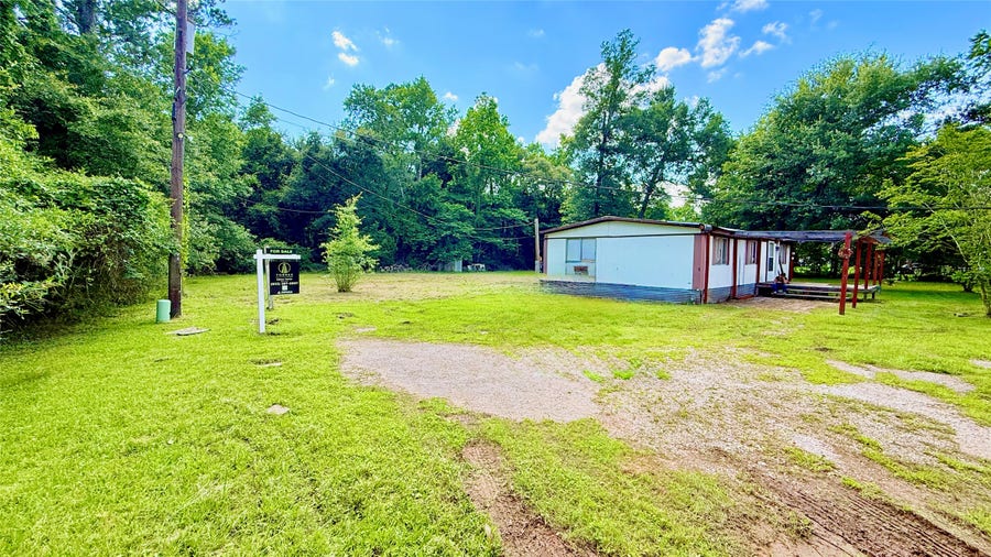 Property photo for 833 Beach Airport Road, Conroe, TX