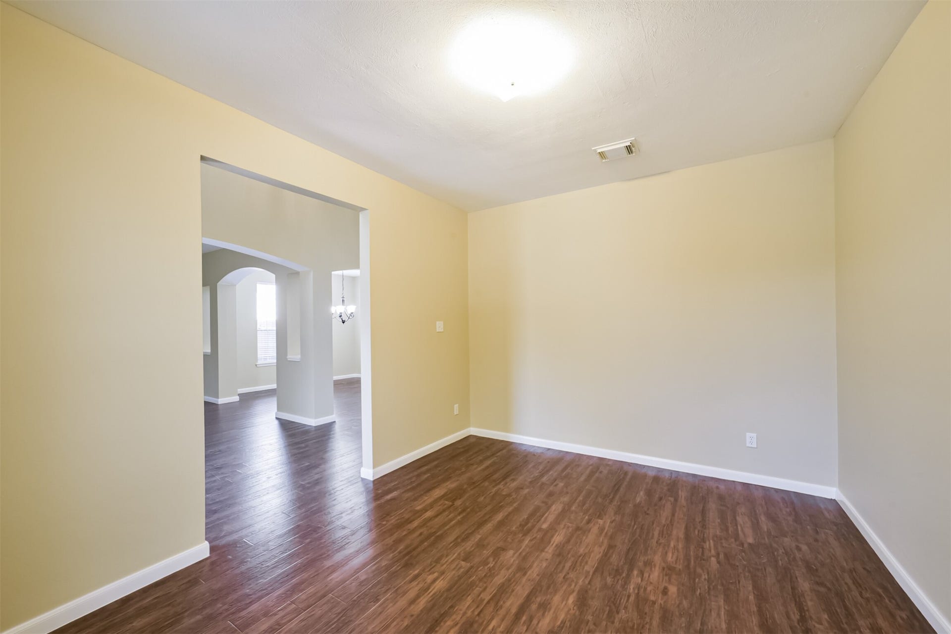 Home office or study with natural light, located at the front of the home.