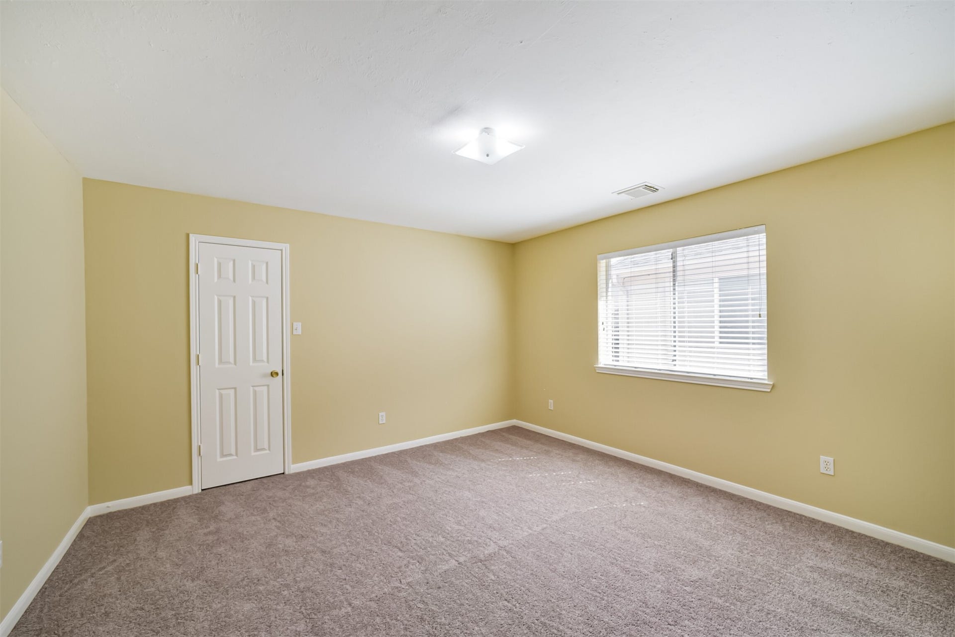 Upstairs bedroom with ample closet space.