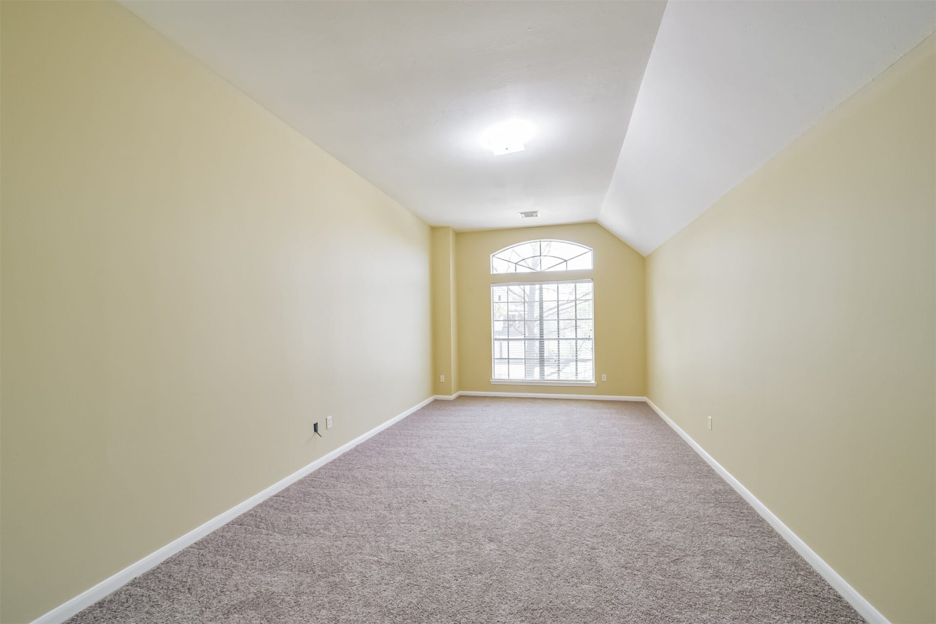Large upstairs bonus room, open to the den, suited for a game room, media area, or play space.