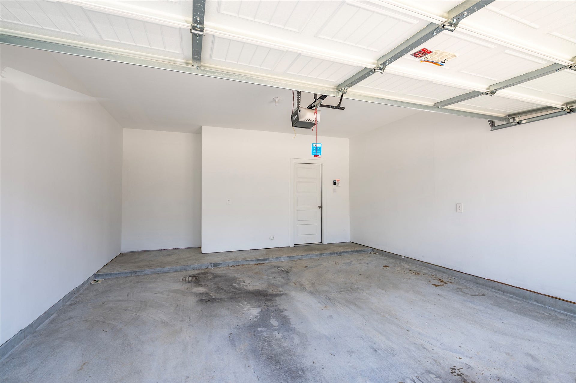 2919 Crown Gate Drive, Houston, TX 77047 Large two car attached garage with garage door opener.