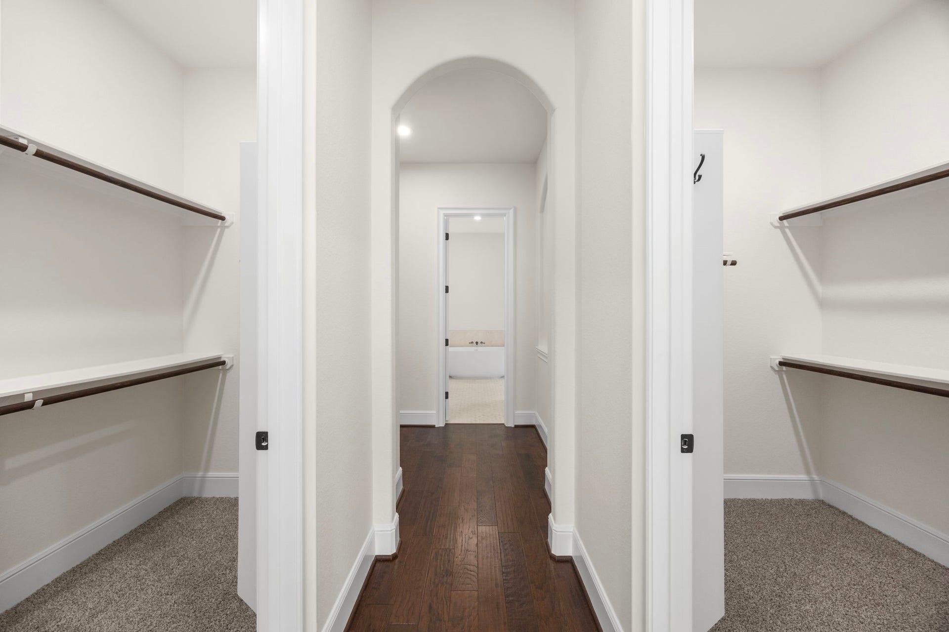 8551 Tombron Grove Road, Magnolia, TX 77354 This beautifully appointed closet easily accommodates an extensive wardrobe.