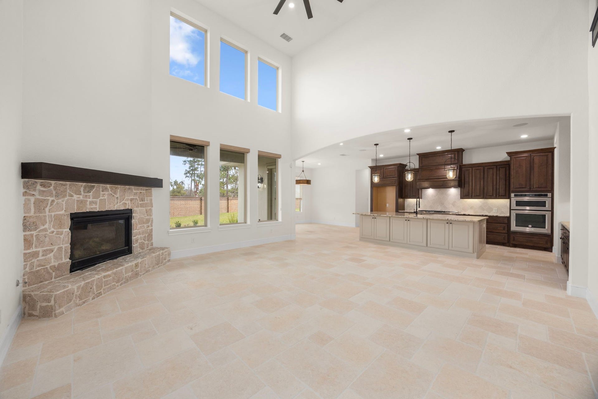8551 Tombron Grove Road, Magnolia, TX 77354 Open-concept layout flows seamlessly into the massive family room for effortless gathering.