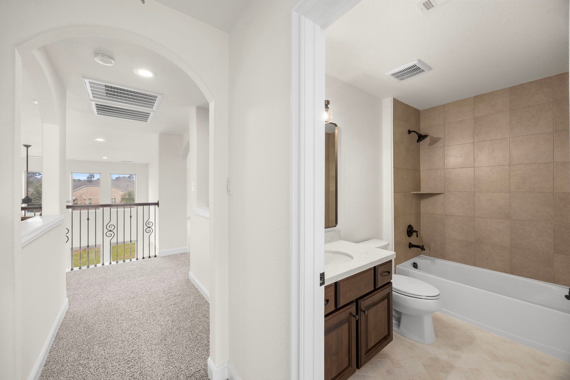 8551 Tombron Grove Road, Magnolia, TX 77354 Secondary bathroom and hallway upstairs.