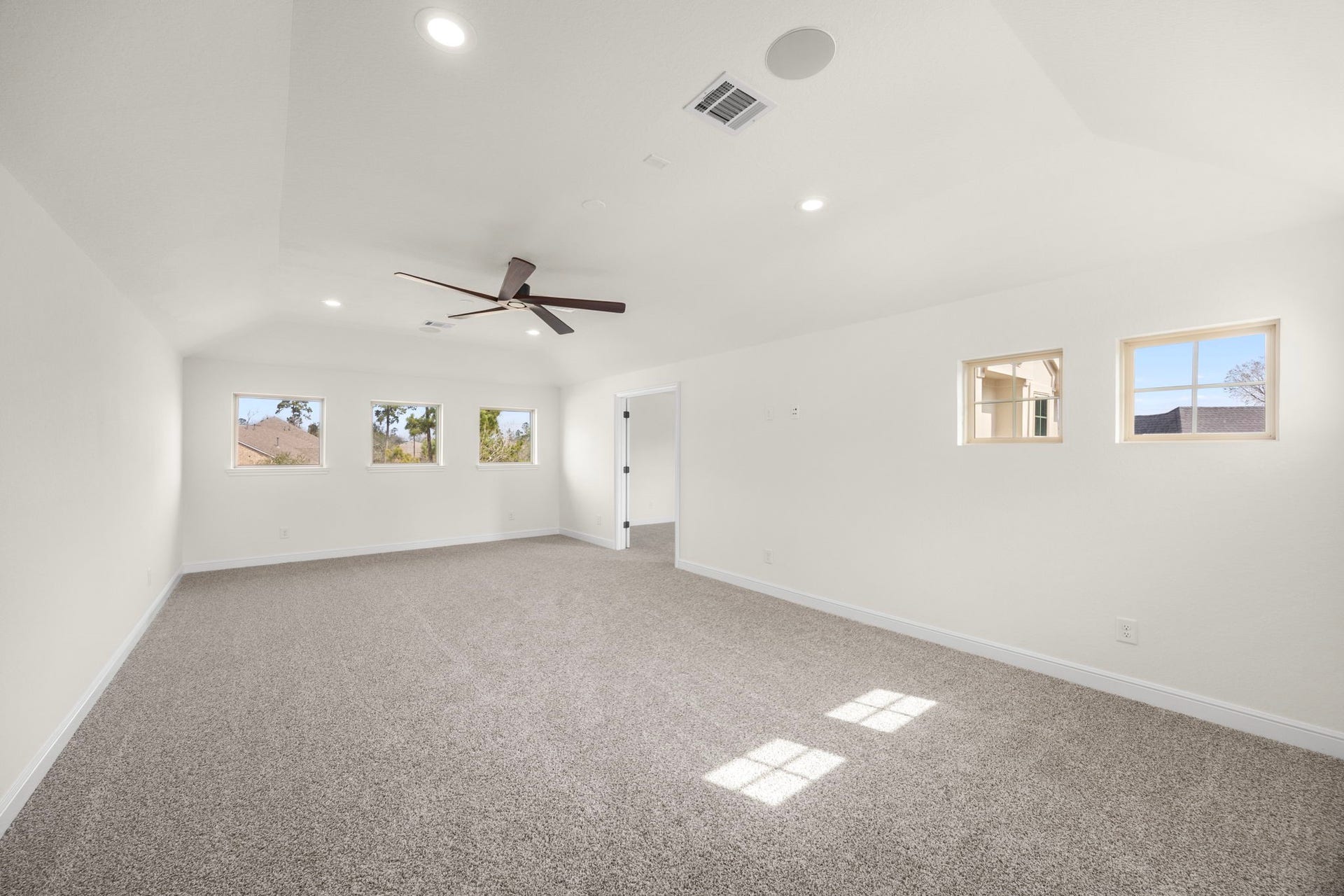 8551 Tombron Grove Road, Magnolia, TX 77354 Spacious game room offering plenty of room for family fun!