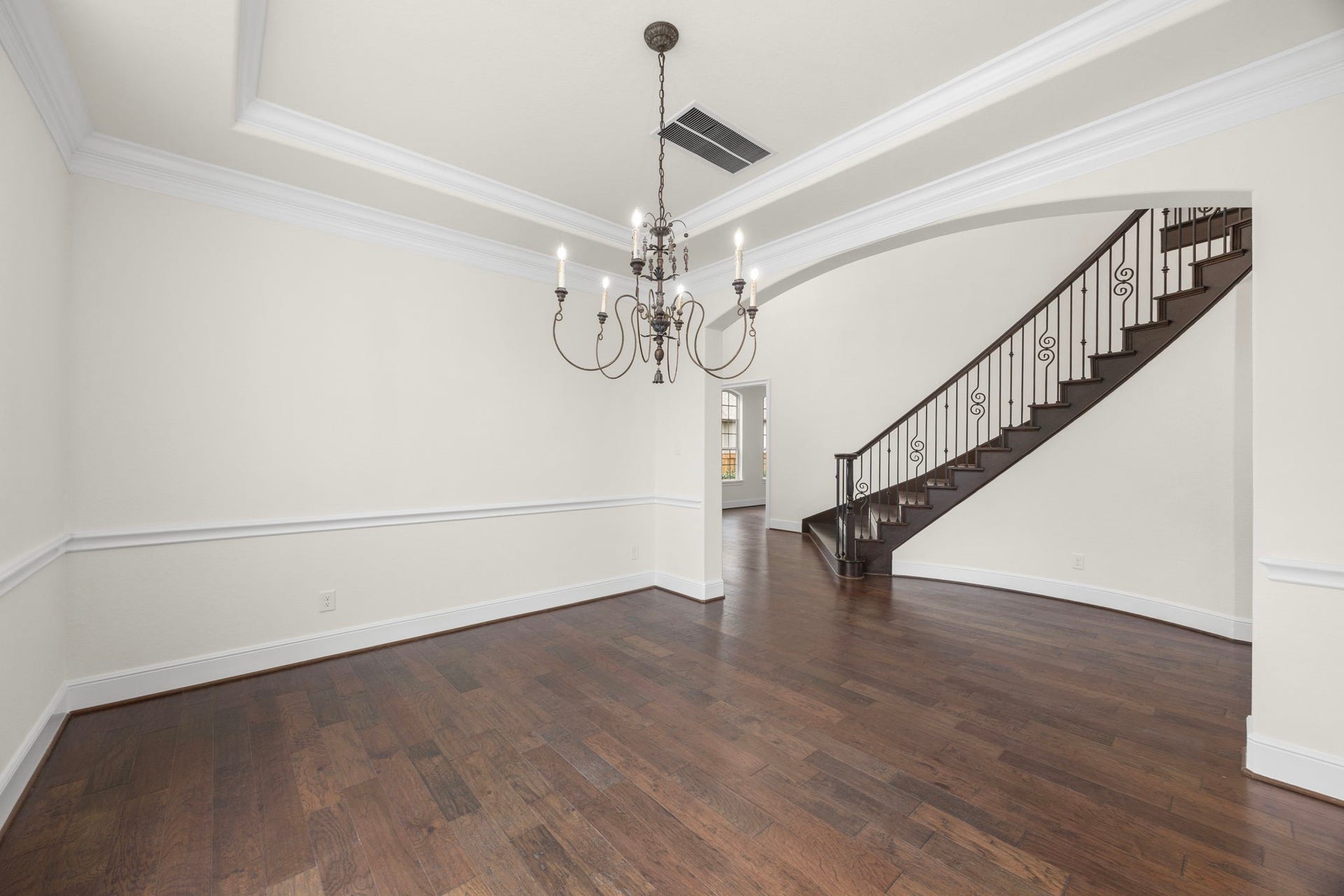 8551 Tombron Grove Road, Magnolia, TX 77354 Generously sized to accommodate large dinner parties or intimate family meals, this dining room offers excellent flow to the kitchen and main living areas for effortless entertaining.