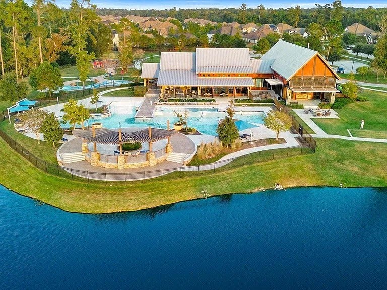 8551 Tombron Grove Road, Magnolia, TX 77354 7.5 acres of fun featuring 9400 sq ft clubhouse and resort amenities with a dog park. Home away from home! Resort-style swimming pool, the perfect oasis for the whole family. Fitness center and 200 acres of open space. Hike and bike trails and entertaining areas with outdoor and indoor gathering areas. Perfect for quiet evenings with the family or a fun night out with friends and neighbors.