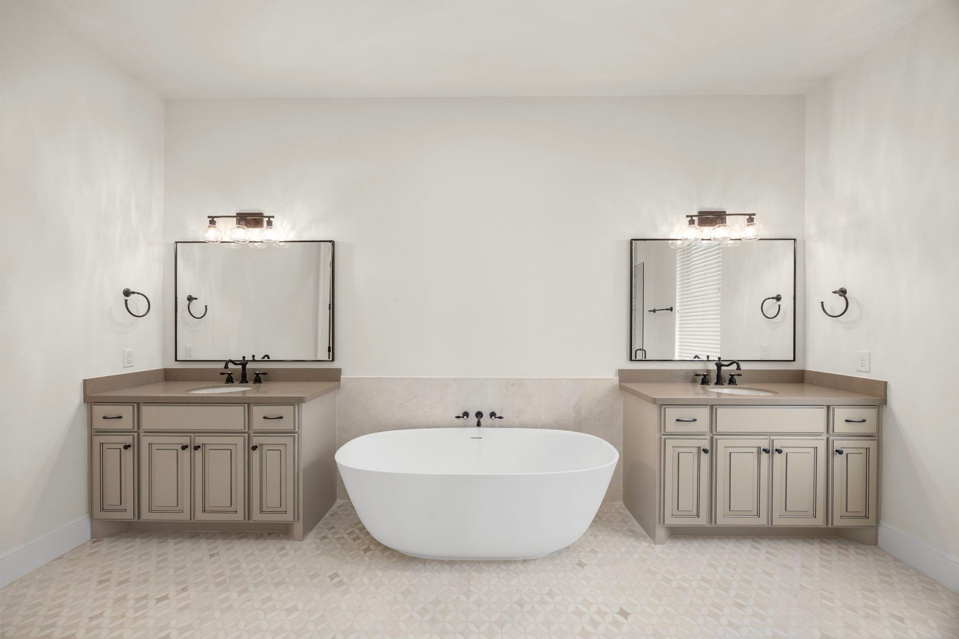 8551 Tombron Grove Road, Magnolia, TX 77354 The spacious layout features a large walk-in shower and soaking tub for relaxation.