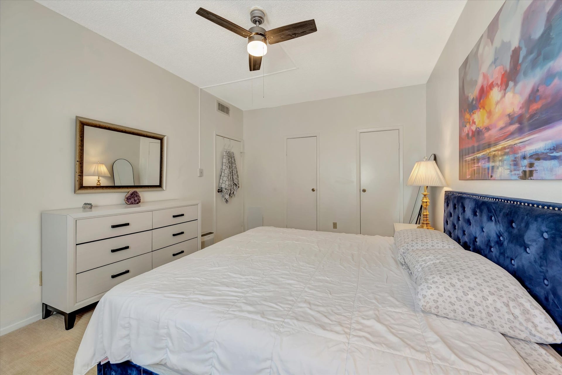 7071 N Holiday Drive, Galveston, TX 77550 Additional view of the primary bedroom showing its layout and ceiling fan.