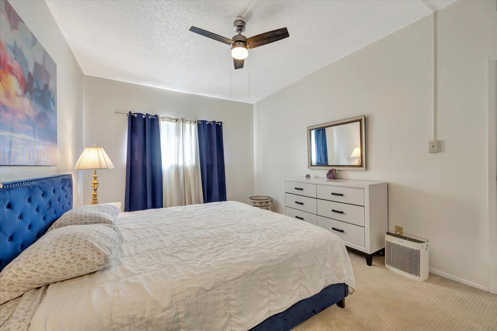 7071 N Holiday Drive, Galveston, TX 77550 Another view of the primary bedroom showing the window and space for additional furnishings.