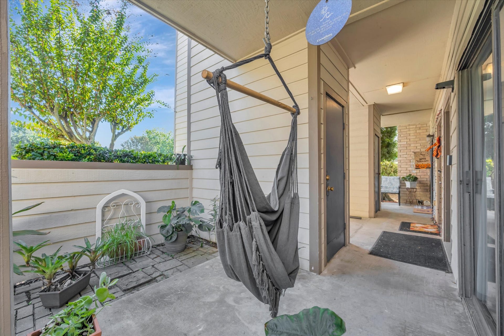 7071 N Holiday Drive, Galveston, TX 77550 Covered patio offers an outdoor spot for relaxing just off the living area.