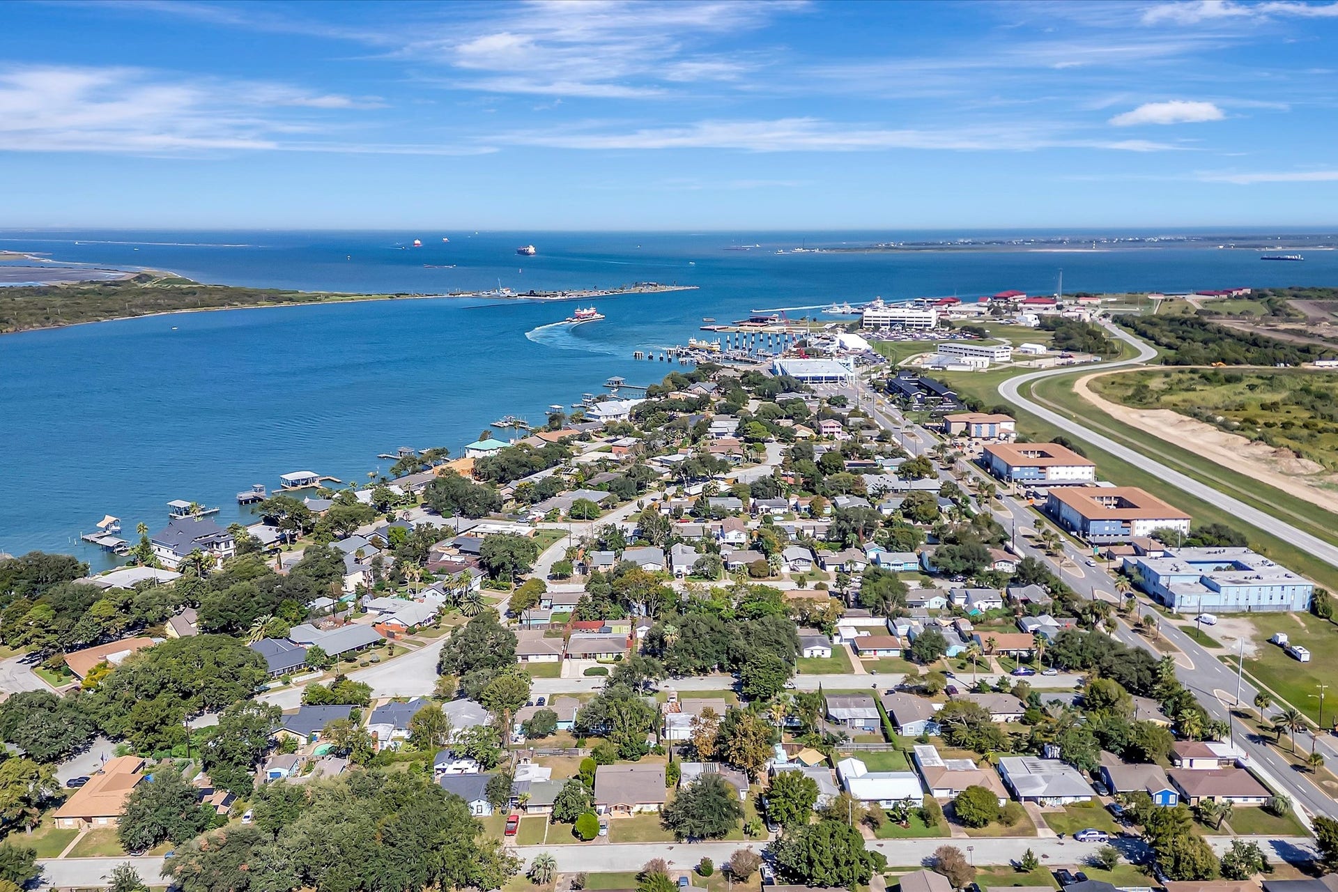 7071 N Holiday Drive, Galveston, TX 77550 Another aerial view highlighting the islands surrounding water and coastal setting.