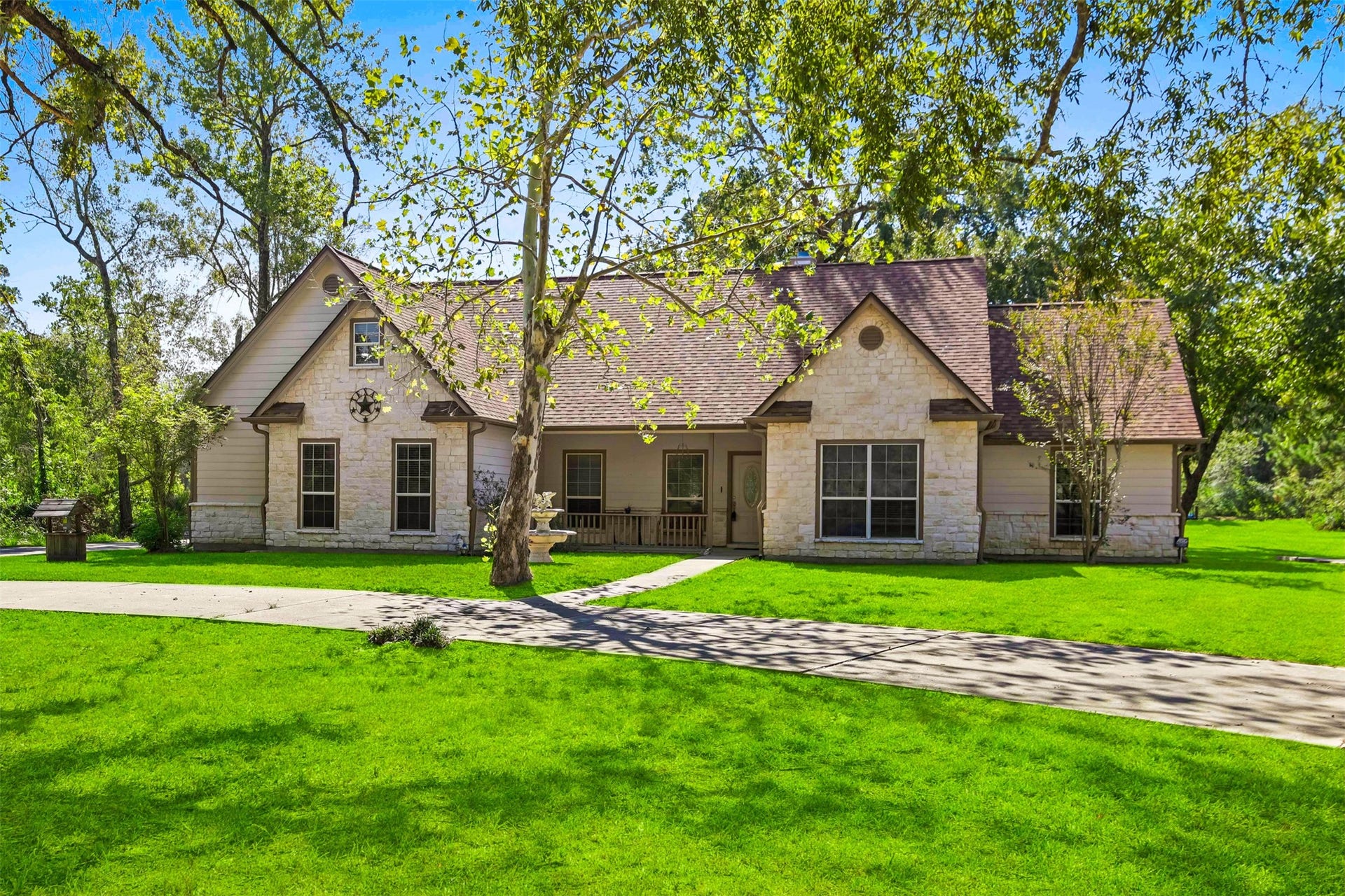 Charming home on 2.2 UNRESTRICTED acrea with a pond for true country living. Home was built in 2002 and both HVACS were replaced in 2026. Beautiful stone elevation with front porch.**Grass virtually enhanced**