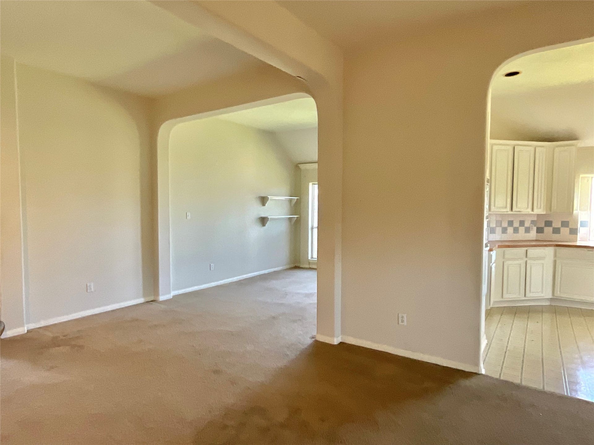 218 Willards Way, Stafford, TX 77477 Family room from windows toward dining area