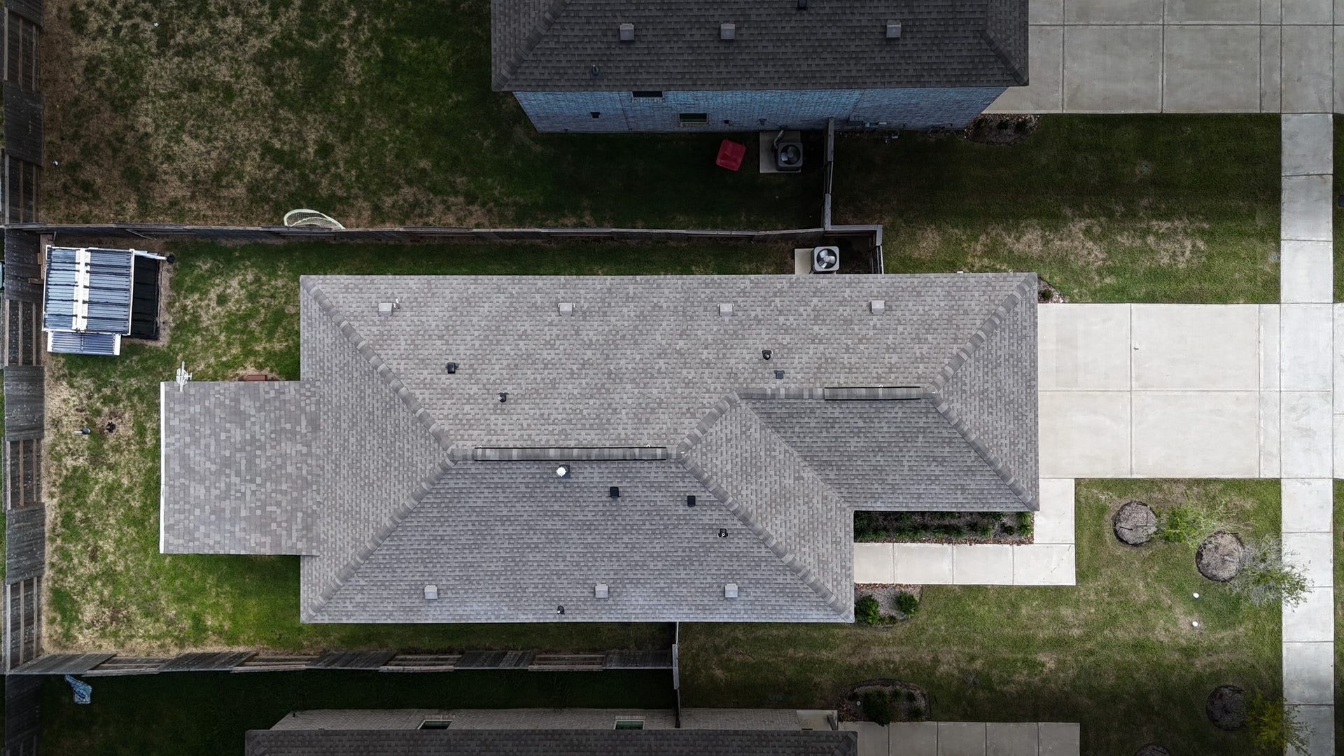 5806 Standpiper Loop, Baytown, TX 77521 A spectacular bird's-eye view showcasing the vast perimeter of the lot, your custom patio, and the included bonus storage shed!