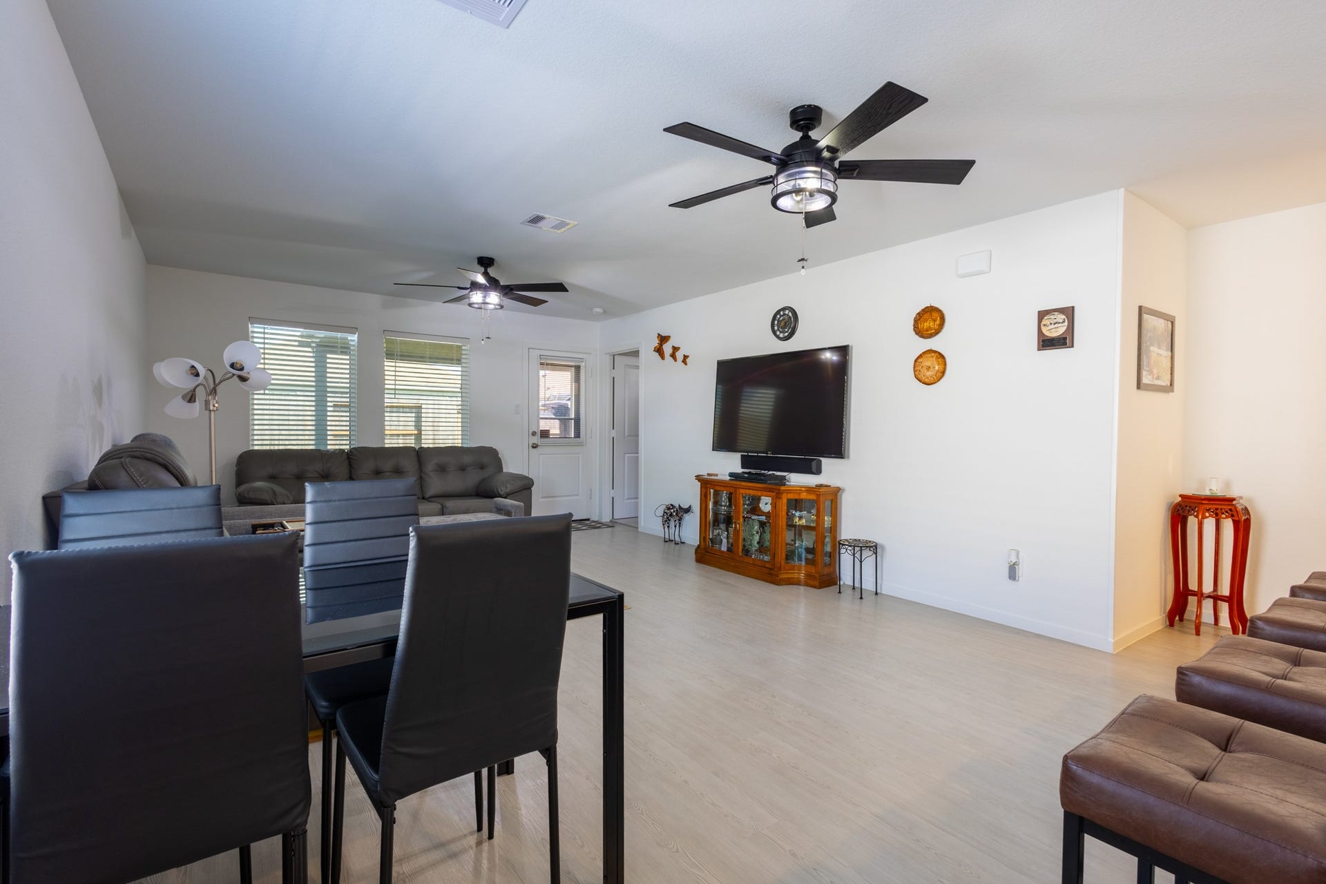 5806 Standpiper Loop, Baytown, TX 77521 The versatile dining space integrates flawlessly into the floor plan, comfortably accommodating a large dining table for festive holiday gatherings.
