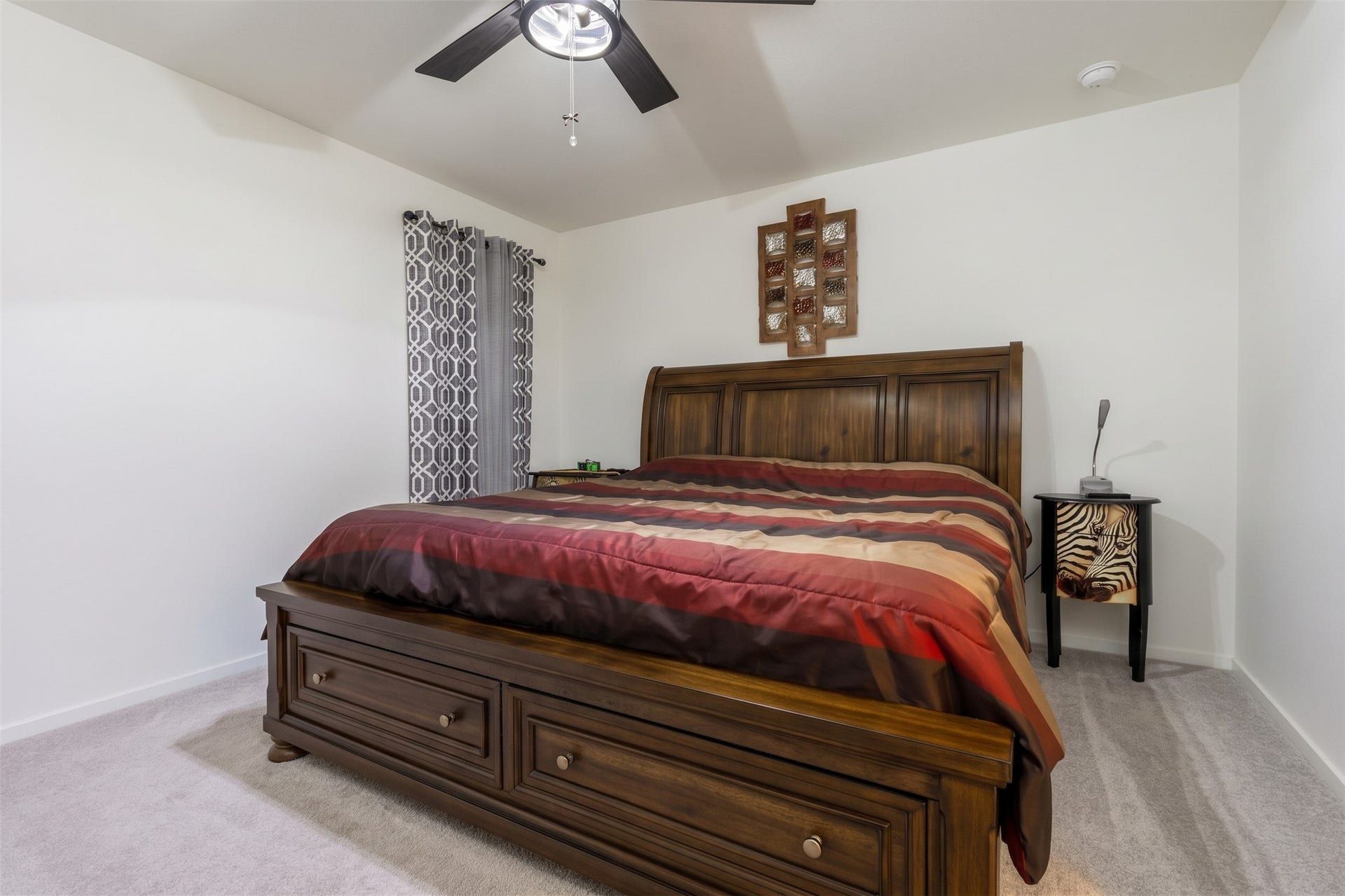 5806 Standpiper Loop, Baytown, TX 77521 Another view of the generous primary bedroom, showing off the ample square footage and the serene color palette.