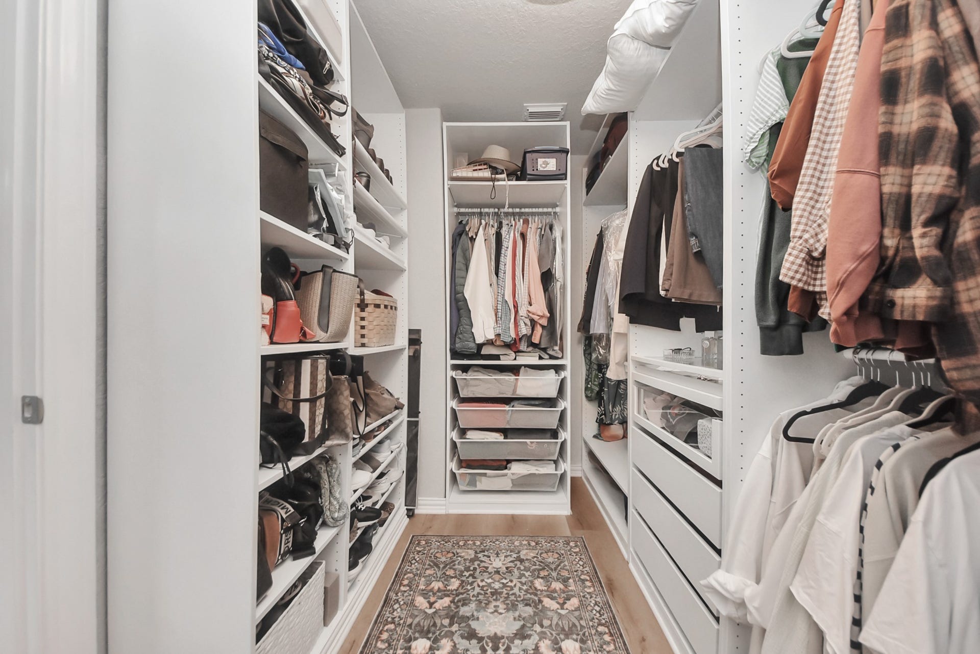 The primary closet organization system is designed to maximize space and functionality