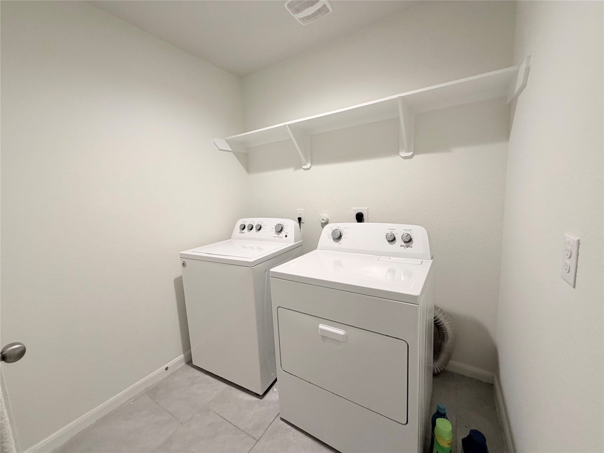 Utility room is located next to the garage. Washer and dryer are included!