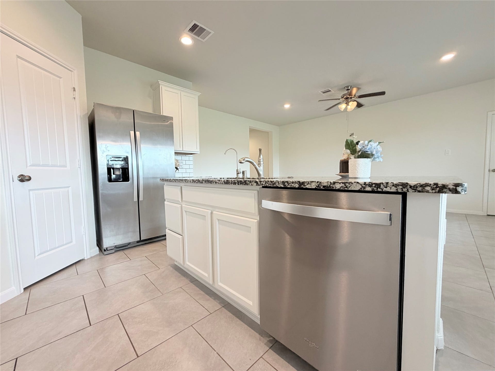 Stainless steel refrigerator shown in photos is not included in the sale.