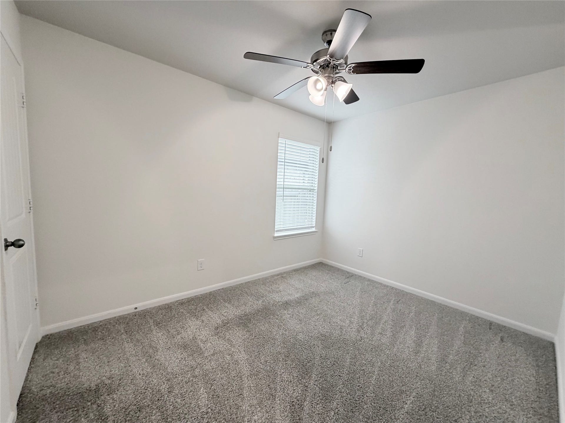 Bedroom 3 has a window facing the side of the home.