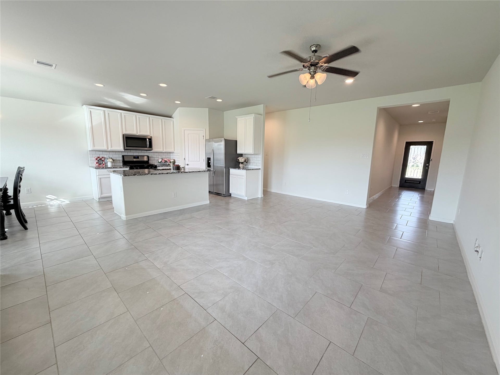 Expansive living area offers plenty of space for relaxing, entertaining and everyday living.
