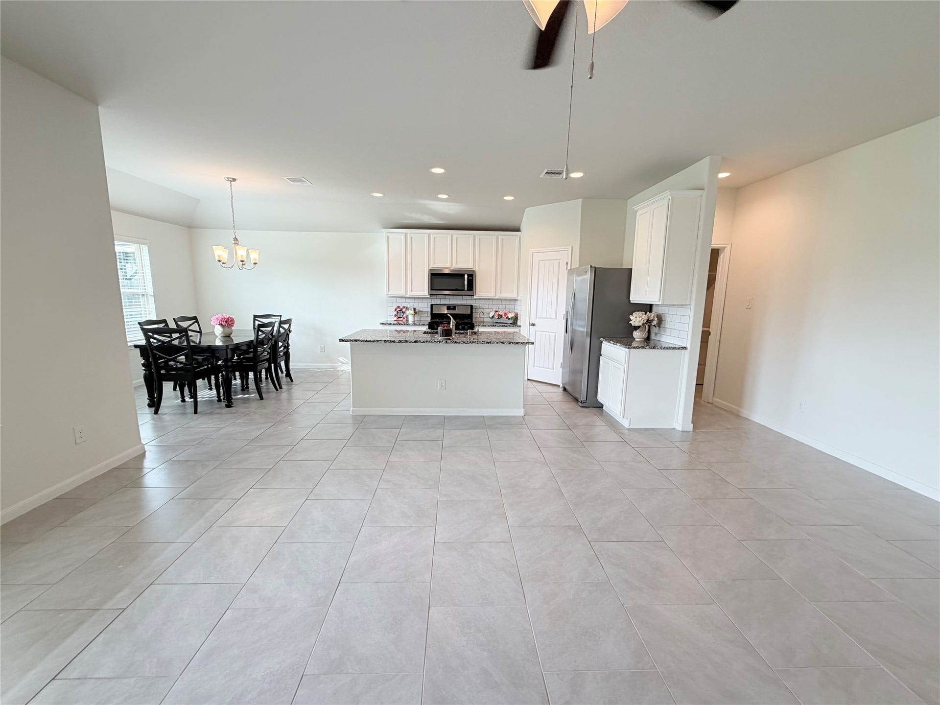 newly painted interior and updated white cabinetry give this home a light, bright, move in ready appeal.