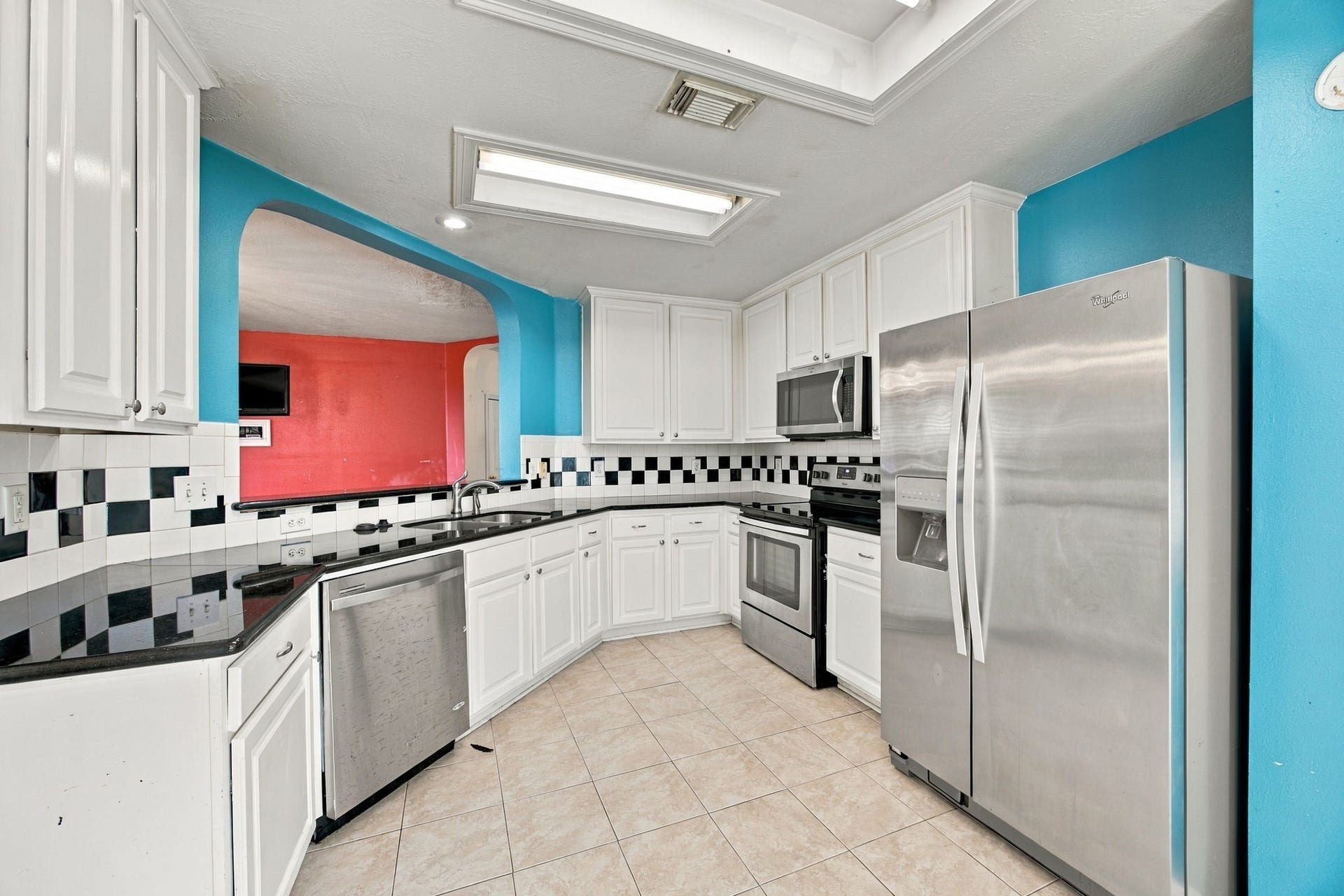 Granite countertops, stainless steel appliances. Refrigerator stays.