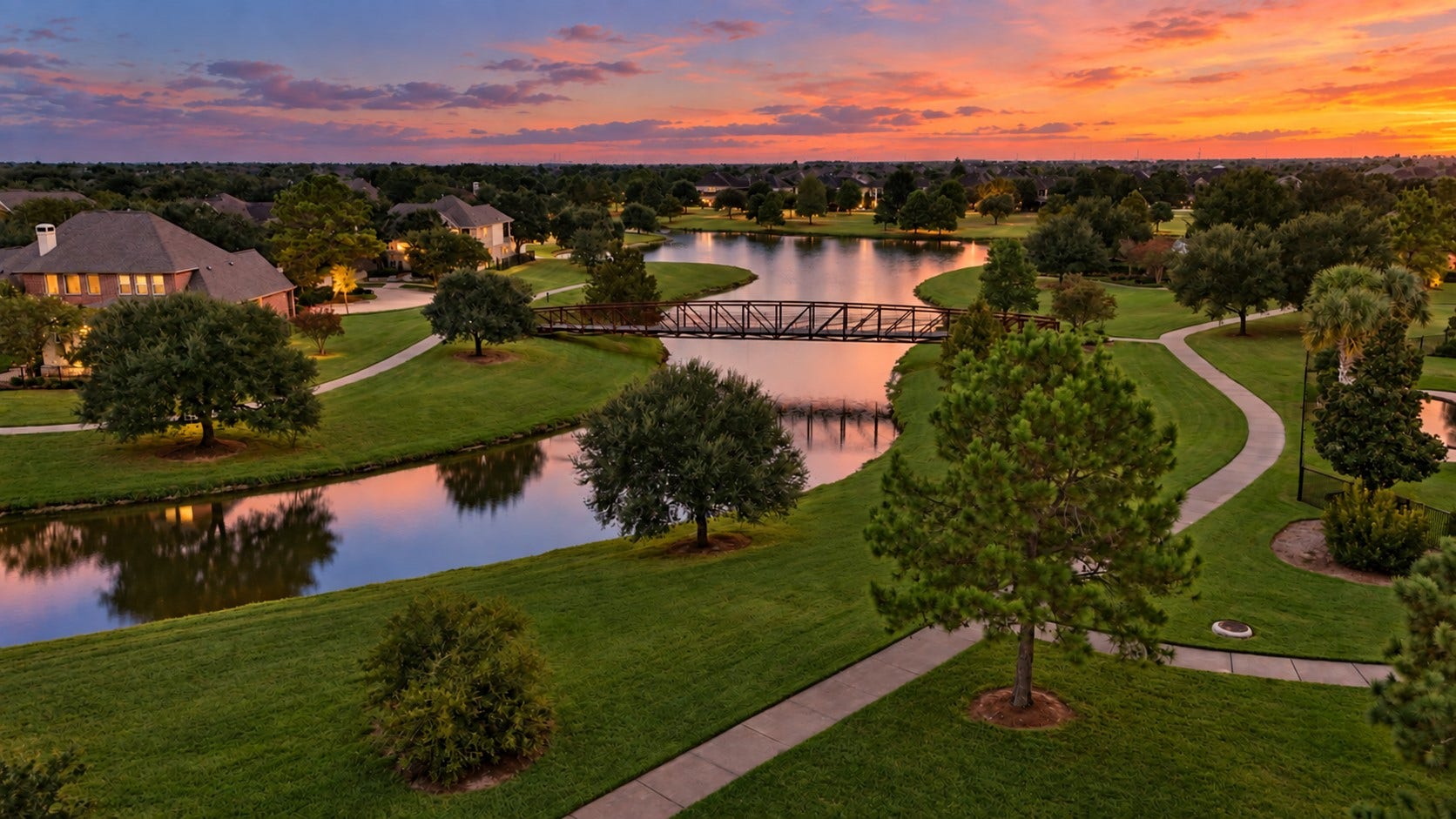 18803 Cove Mill Lane, Cypress, TX 77433 Tranquil view of the pedestrian bridge from the backyard.