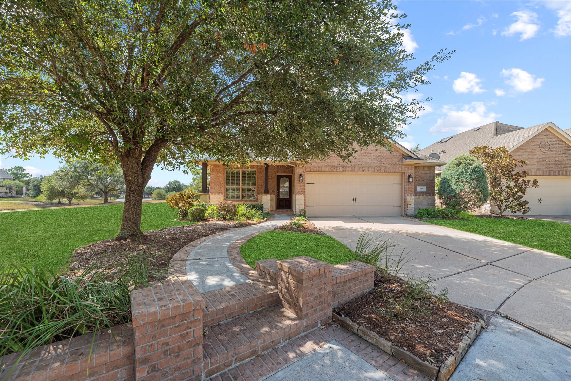 18803 Cove Mill Lane, Cypress, TX 77433 Charming 3-bed/2-bath + office home with extended garage at the end of a cul-de-sac with beautiful lake to the left and greenbelt behind.