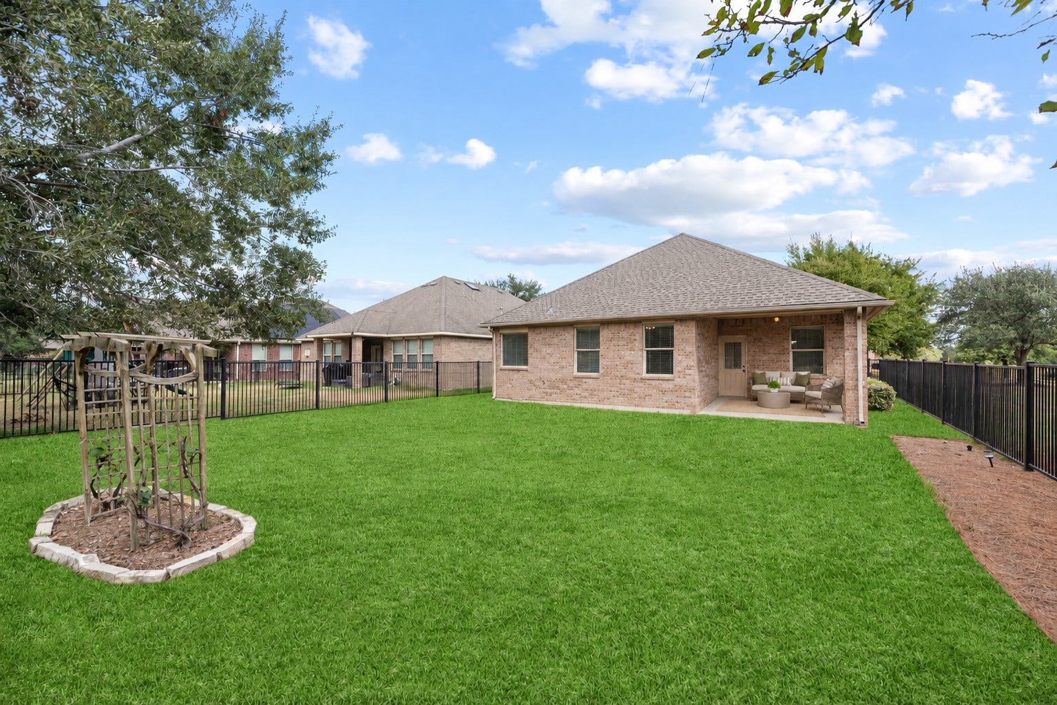 18803 Cove Mill Lane, Cypress, TX 77433 Oversized backyard with coverered corner patio overlooking the lake.