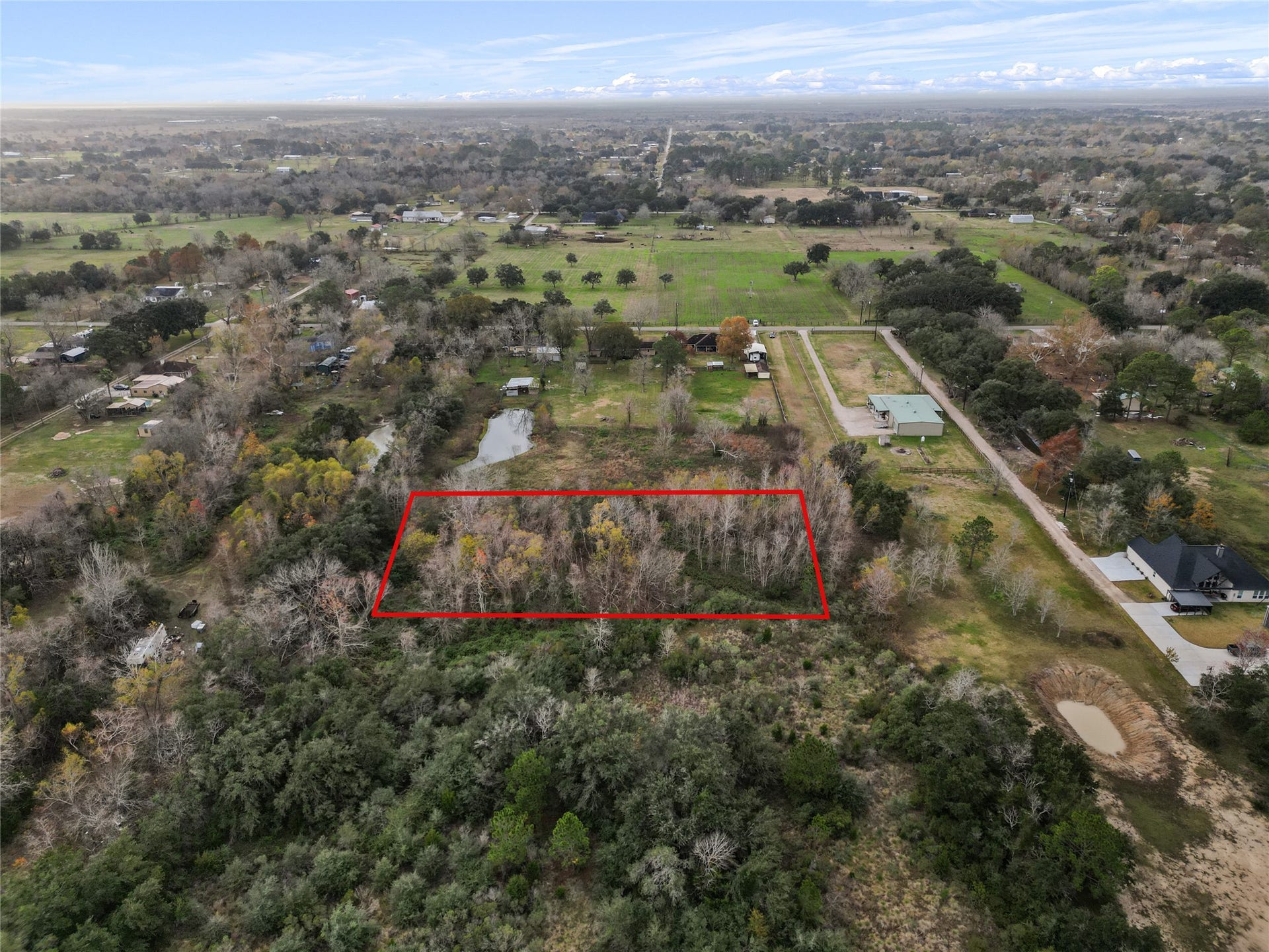 000 28th Street, Santa Fe, TX 77510 5 acres nestled back off 28th street which gives you all the privacy you want