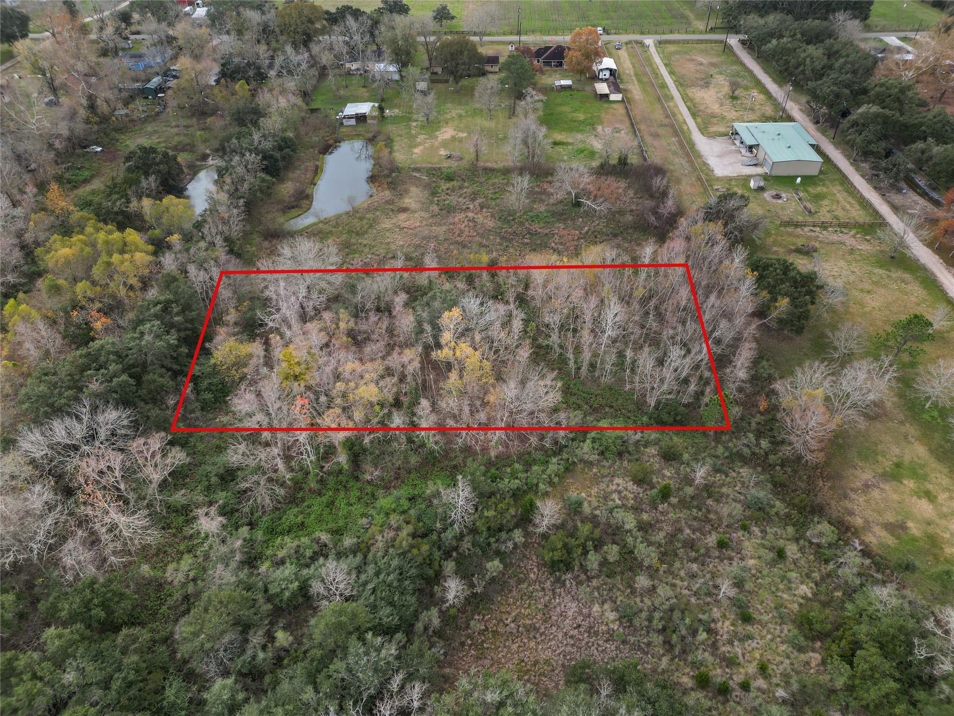 000 28th Street, Santa Fe, TX 77510 5 acres nestled back off the main street