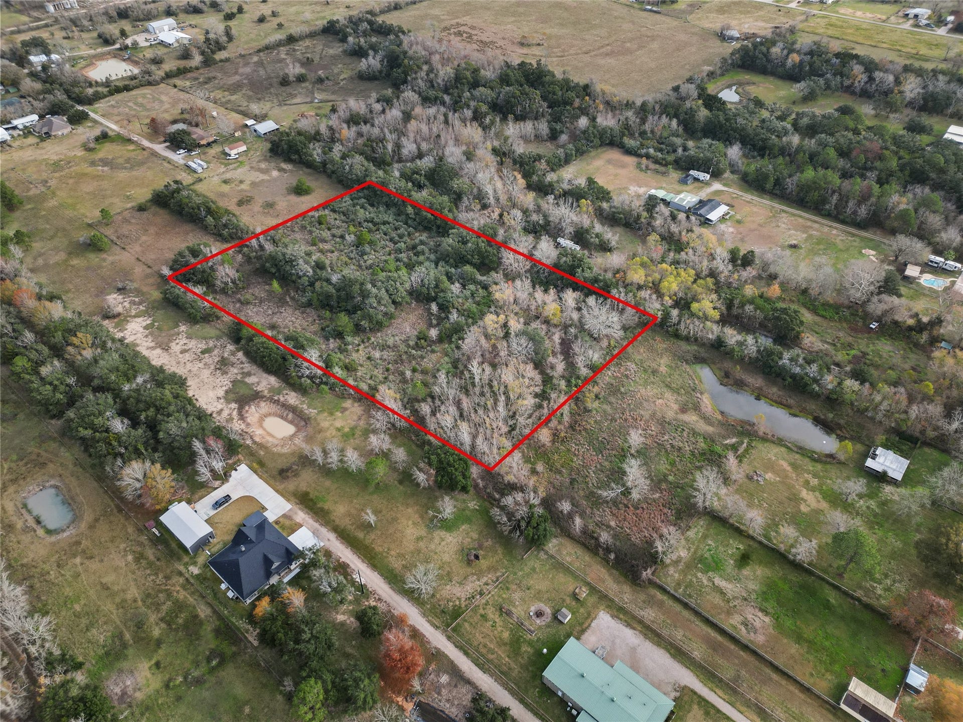 000 28th Street, Santa Fe, TX 77510 The easement runs straight into this rectangle. This is 5 acres to do what you want with. So many options, perfect privacy, sits back off of 28th st.