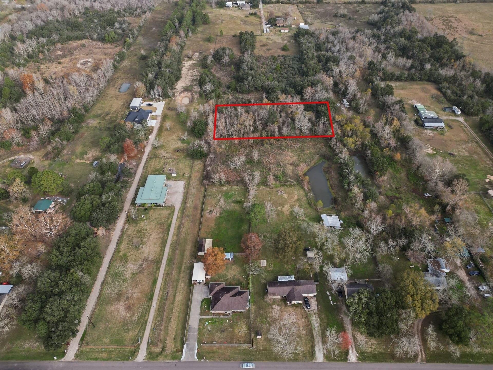 000 28th Street, Santa Fe, TX 77510 Sits back behind houses and 2 open acres giving you the privacy you want