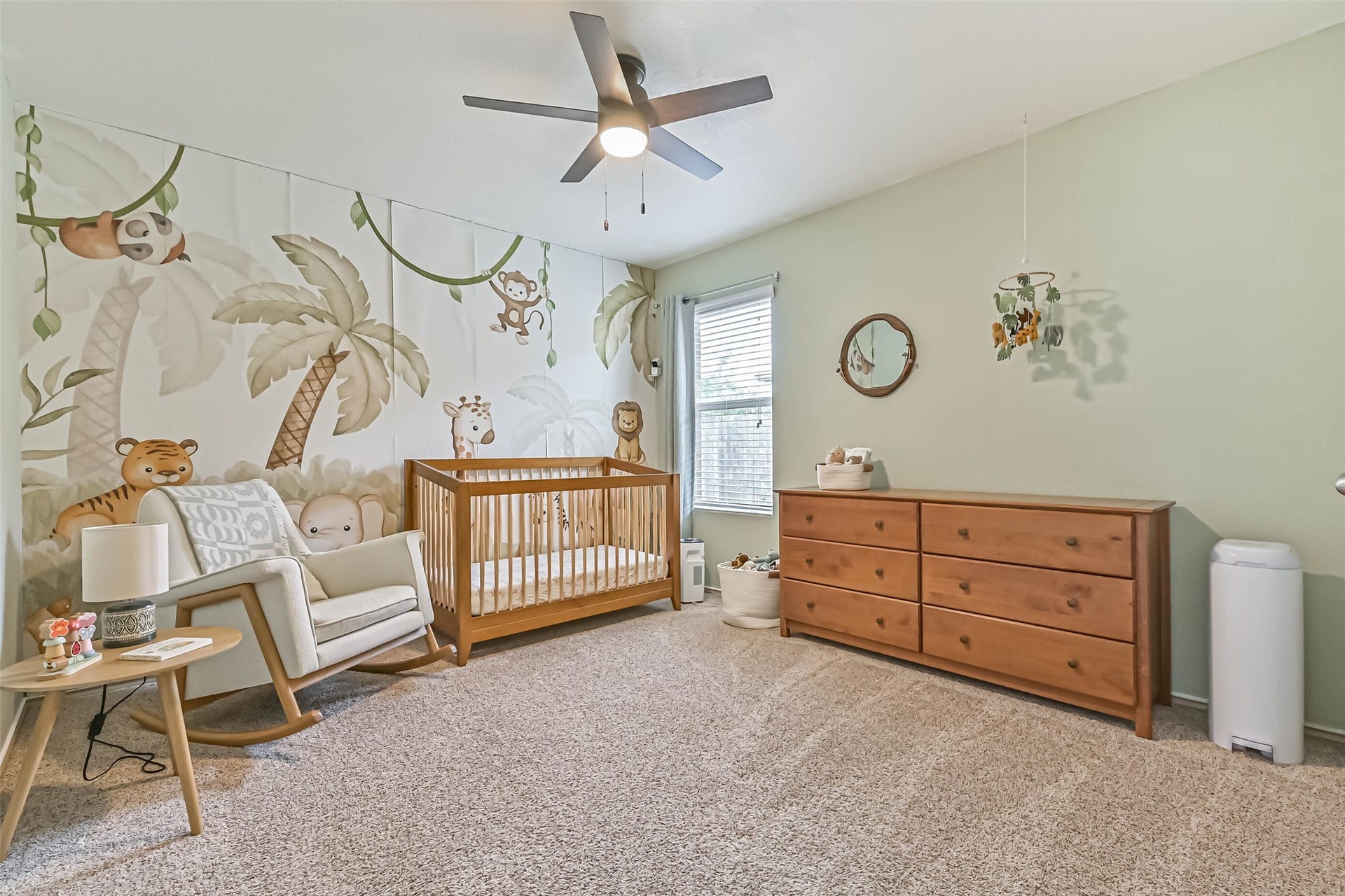 A view of the second bedroom from the entrance. Wallpaper is removable.