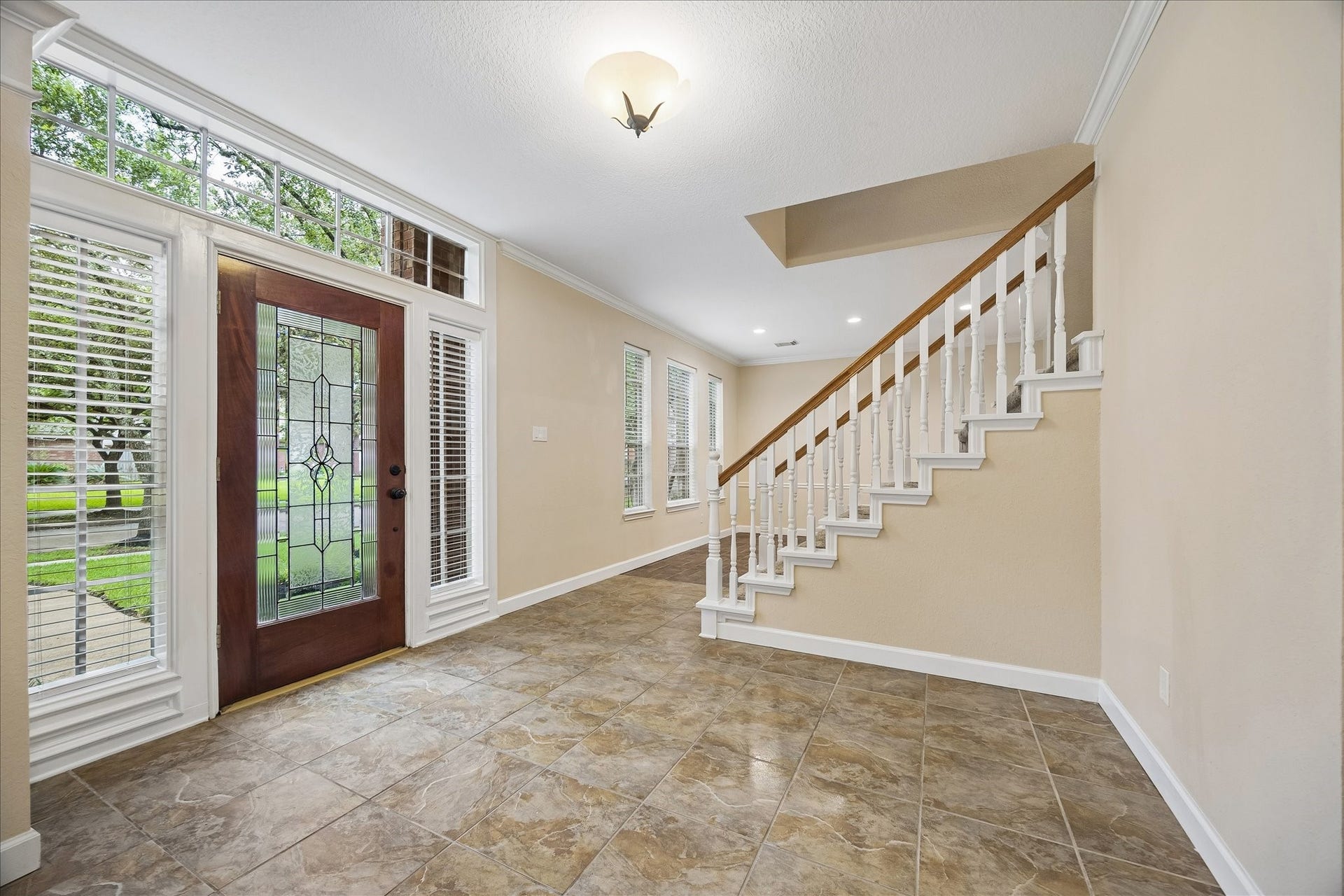 16715 Colony Terrace Drive, Sugar Land, TX 77479 One inside, you step into this large foyer. Straight ahead past the stairs is the large dining room, which then goes to the kitchen. Behind is the office/study.