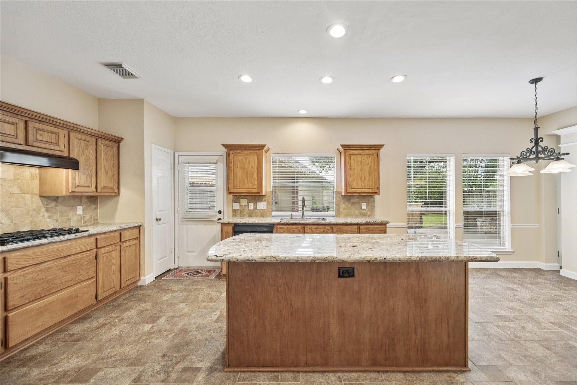 16715 Colony Terrace Drive, Sugar Land, TX 77479 This is the view walking into the kitchen from the dining room.