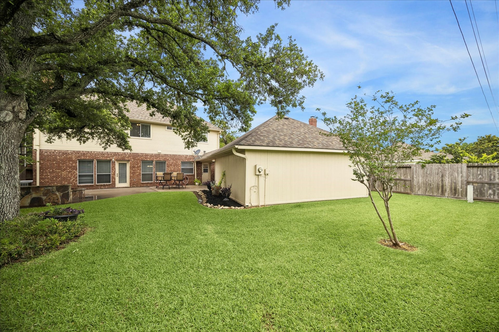16715 Colony Terrace Drive, Sugar Land, TX 77479 And another view of the backyard that extends behind the garage. Great place to put a garden! This home is zoned to top-rated schools - Colony Meadow Elementary, Settlement Middle School & Clements High School. And easy access to Hwy 59, Hwy 6, Hwy 90 & 99 Tollway. And tons of restaurants, shopping and entertainment!
