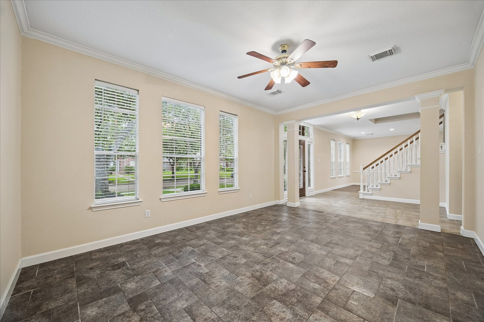 16715 Colony Terrace Drive, Sugar Land, TX 77479 And now we are over in the study/office. Could be used as a formal living room as well. Tile flooring throughout the first floor. There are 2 A/C units and were replaced in 2019 and 2021, respectively. The entire duct work was replaced in 2023.