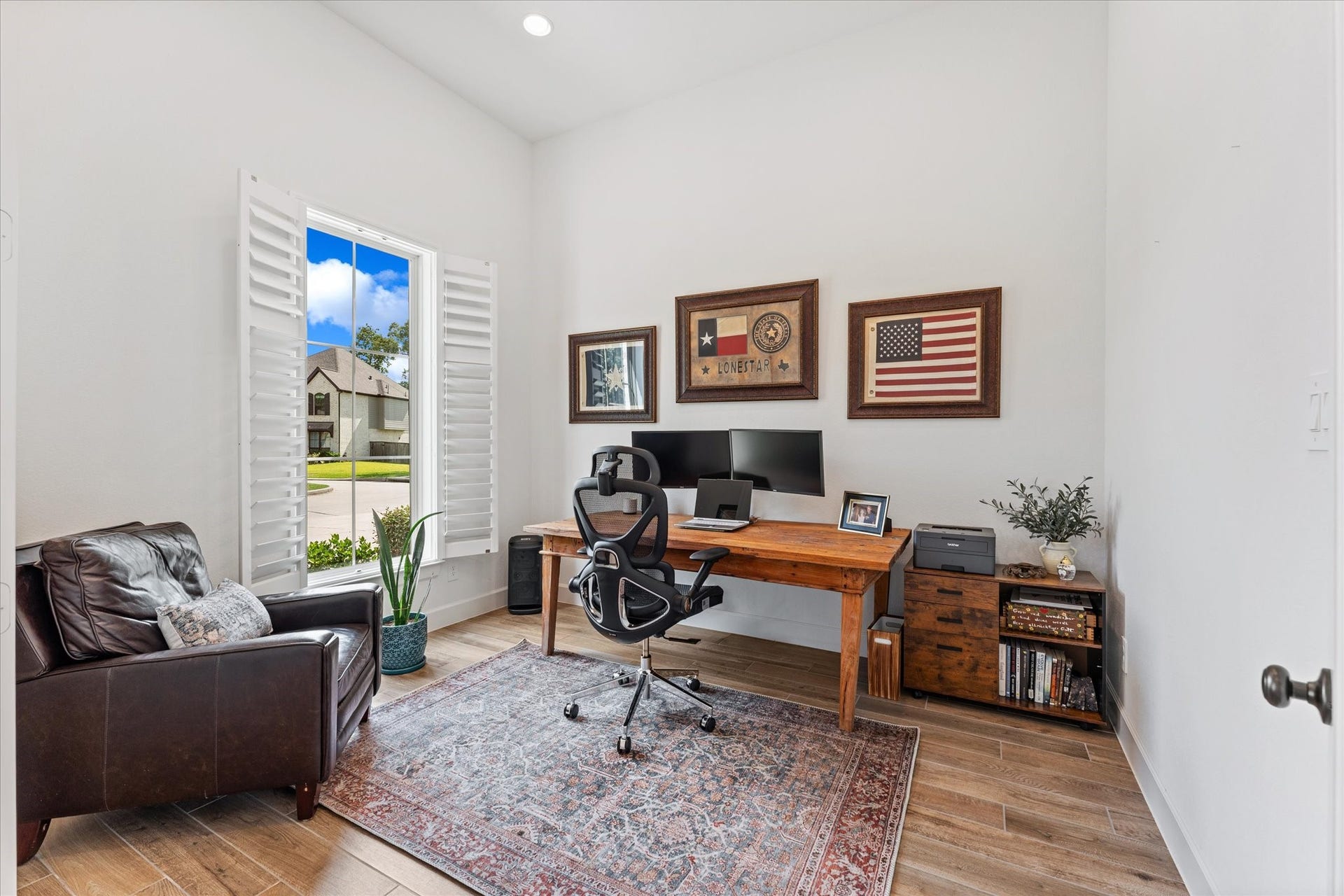 607 Starlit Sky Court, Willis, TX 77318 Light filled private office with French doors & plantation shutters