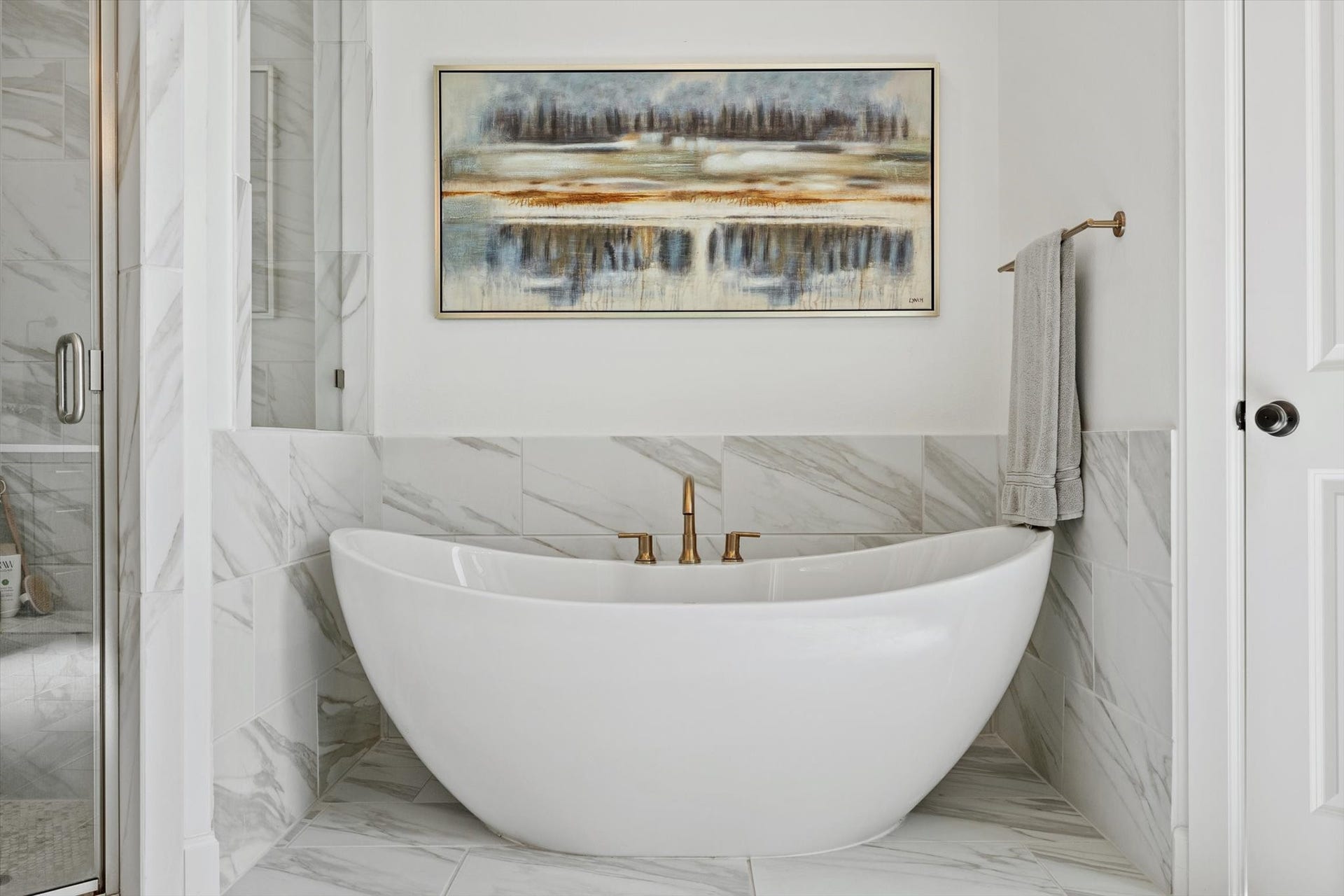 607 Starlit Sky Court, Willis, TX 77318 Freestanding tub with champagne bronze fixtures