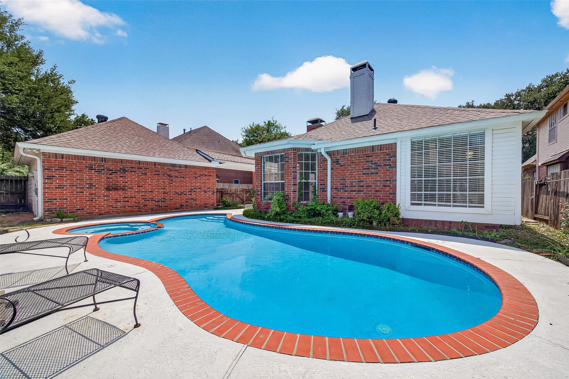 3215 Quiet Lake Drive, Katy, TX 77450 Discover tranquility at 3215 Quiet Lake, featuring a serene backyard perfect for relaxation.