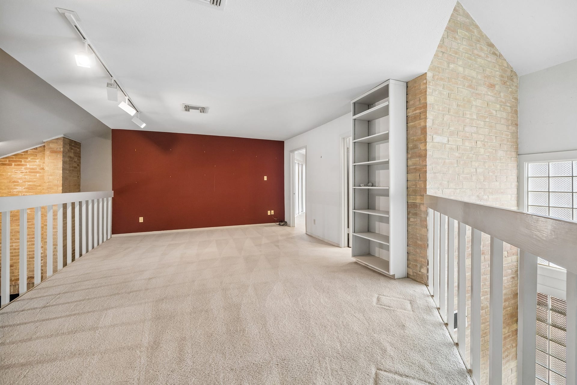 10327 Olympia Drive, Houston, TX 77042 On the second floor is a family room loft area and two additional bedrooms.