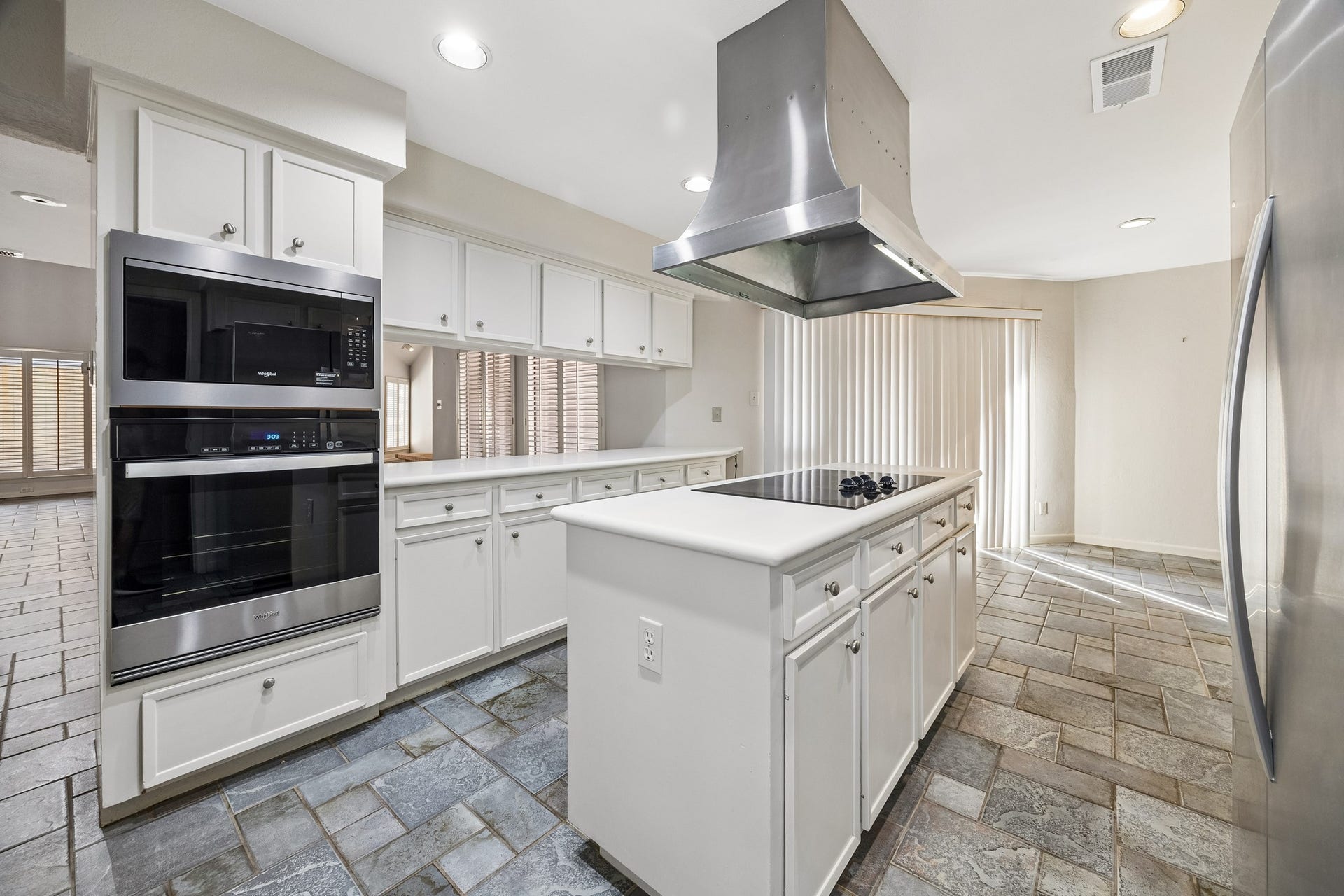 10327 Olympia Drive, Houston, TX 77042 The kitchen features updated stainless appliances and lots of great counter space.