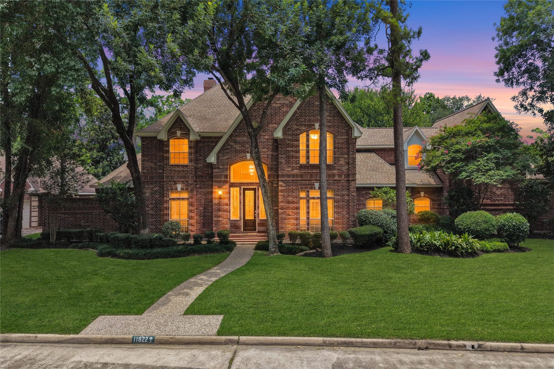 11822 Primwood Drive, Houston, TX 77070 Stately all-brick exterior with timeless architecture and exceptional curb appeal.