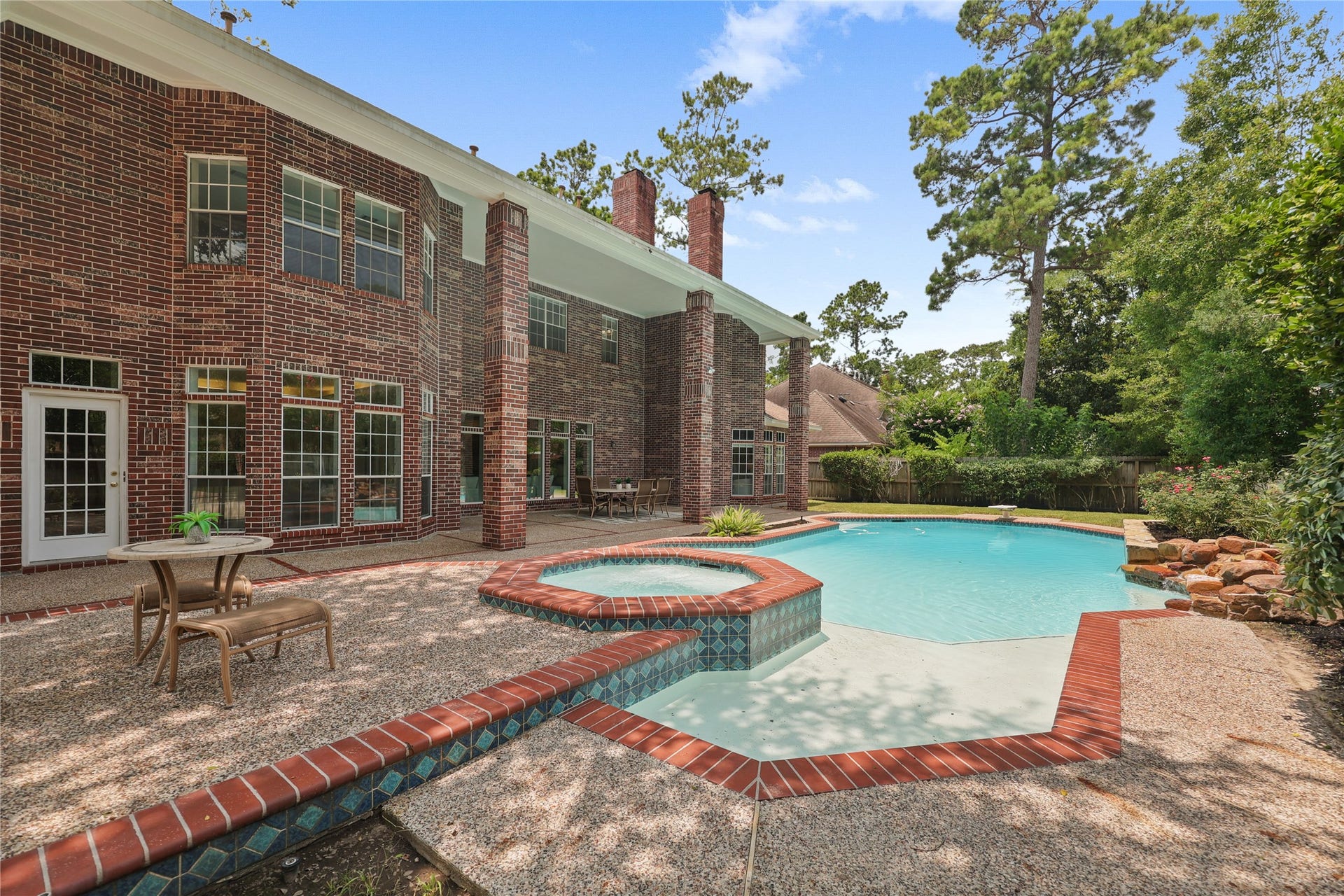 11822 Primwood Drive, Houston, TX 77070 Exceptional backyard retreat combines luxury, privacy, and year-round enjoyment.